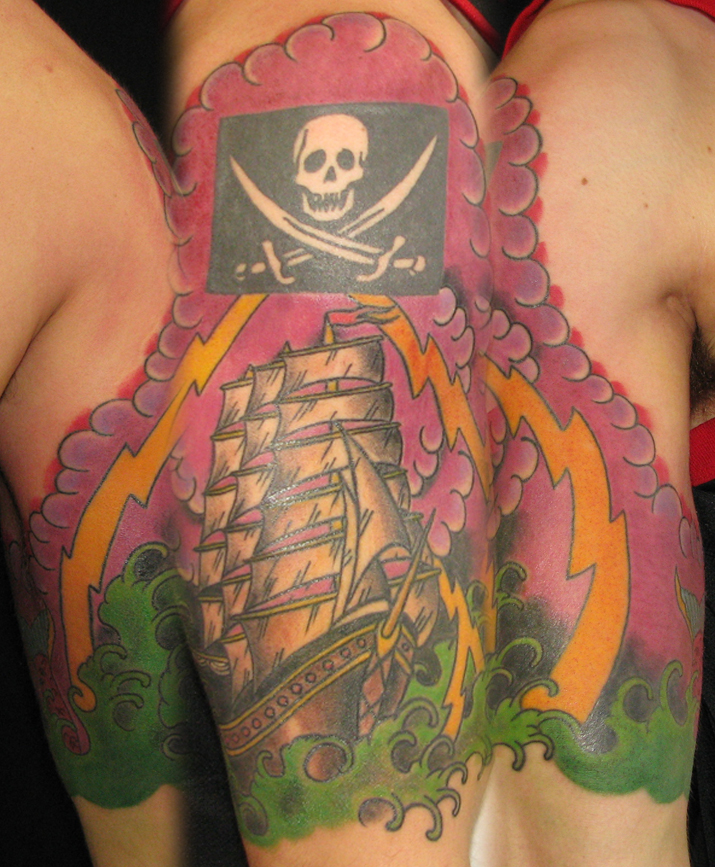 pirate ship tattoos. The dude sat like a pirate. :)