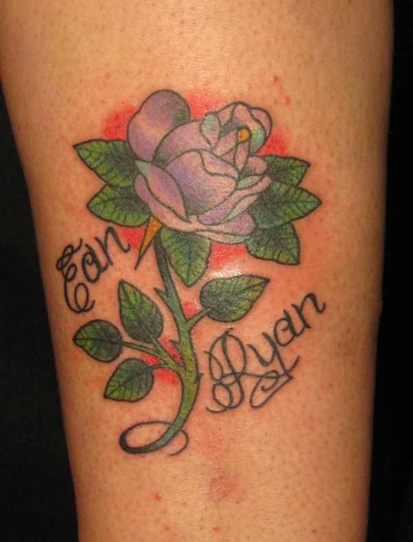 tattoo lettering names. Rose and names.