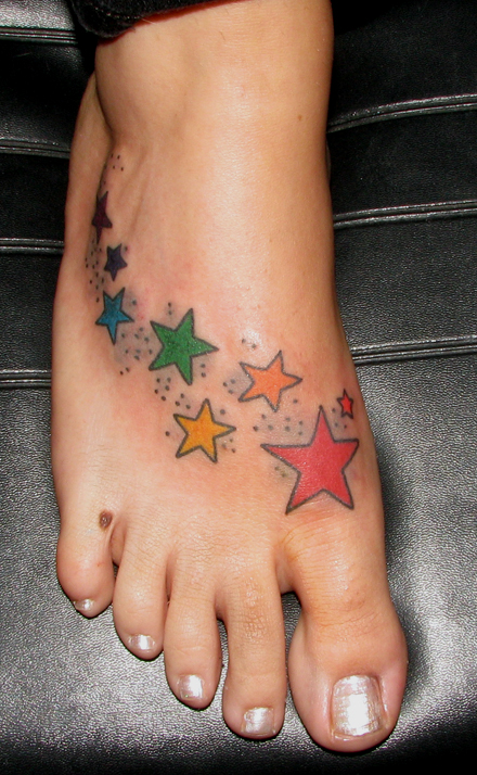 Posted in girly tattoos with tags cute foot girly rainbow stars tattoo 